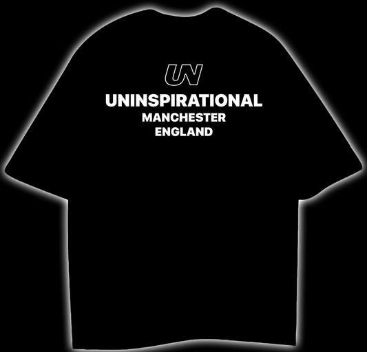 UNINSPIRATIONAL MANCHESTER ENGLAND - OVERSIZED T-SHIRT